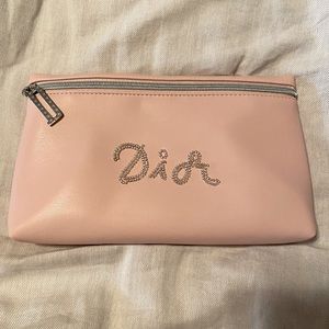 Light pink Dior clutch/makeup bag